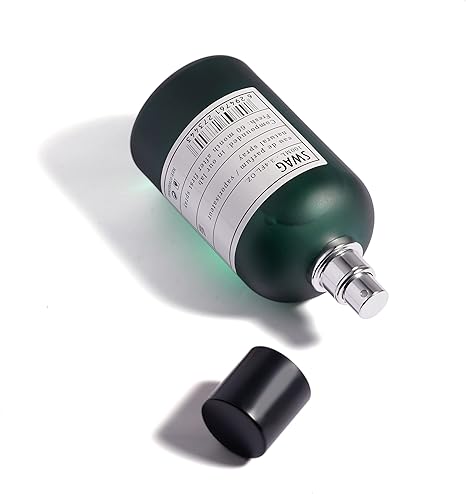 Green bottle with silver cap on a white background